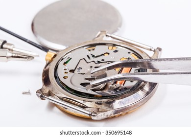 Repairing of watch - replacing battery in quartz watch close up