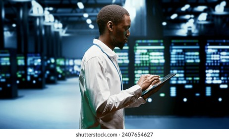Repairman doing annual checkup in blockchain technology application specific integrated circuit supercomputer establishment. System administrator doing technical investigations in mining farm