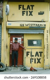 A Repairman At A Tire Shop, South Bronx, NY City