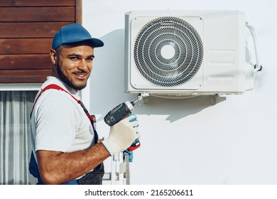 Repairman Uniform Installing Outside Unit Air Stock Photo 2165206611 ...