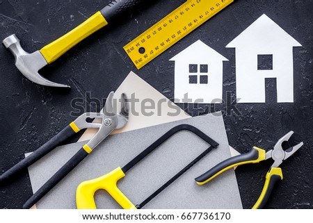 Reparing home concept. Tools on black stone desk background top view