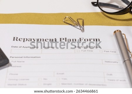 Repayment Plan Form with Pen on Desk – Financial Agreement and Debt Management Concept

