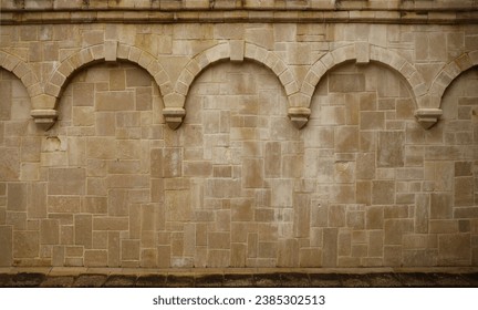 Repeating columns on a block wall in a medieval church in Rouen France - Powered by Shutterstock