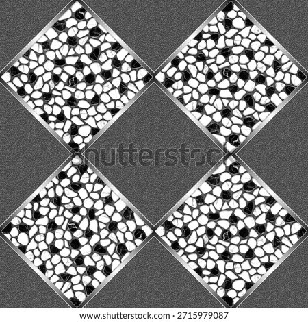 A repeating geometric tile pattern featuring diamond-shaped sections filled with black and white pebbles and gray grout.