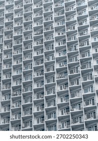 Repeating Grid Pattern Modern Residential Building Facade in Makati, Philippines
the highly repetitive, geometric grid created by the endless array of balconies and windows.