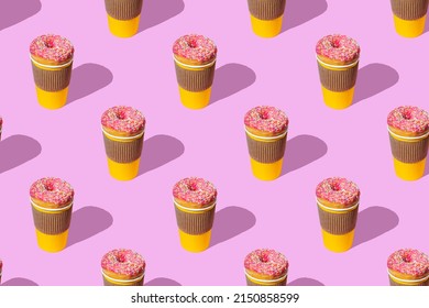 A repeating pattern of a red donut and a yellow cup of coffee on a pink background.