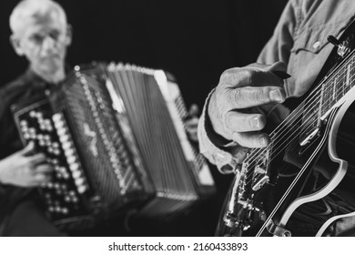 Repetition. Vintage, Retro Style. Black And White Portrait Of Two Senior Men, Musicians With Guitar And Accordion At Music Studio. The Older Generation. Concept Of Art, Music, Style And Creation.