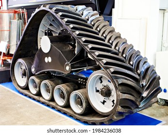 Replaceable Continuous Track Drive For Agricultural Harvester