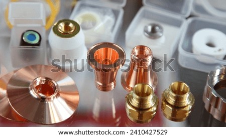 Replaceable details for laser cutting and welding machines - fittings and cones