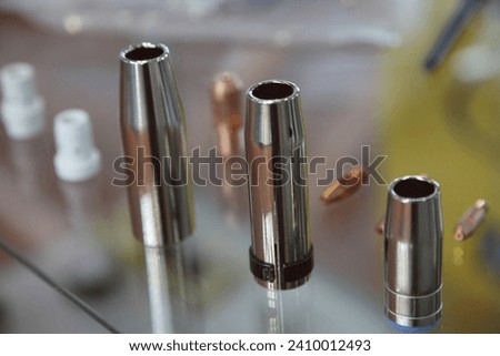 Replaceable nozzles for MIG MAG welding torch