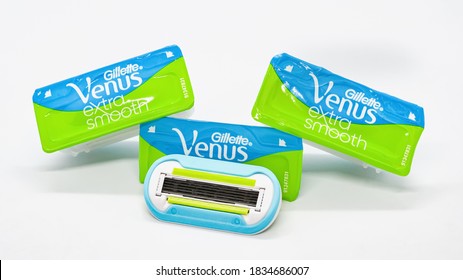 Replacement Cassettes For Womens Shaving Razors Gillette Venus Embrace With 5 Blades On White Background. Epilation With Shaving Razor. Cassettes In Package And Without. Moscow Russia- 10.16.2020