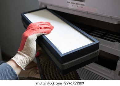 Replacement of the filter in the ventilation system. The ventilation system in the apartment. - Shutterstock ID 2296753309