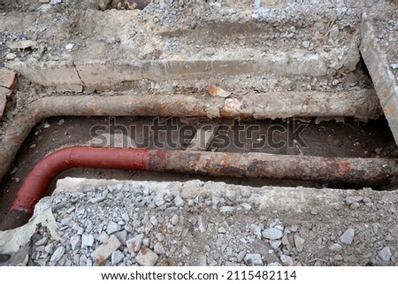 Replacement of old sewer pipes.Old worn-out excavated water pipes. The concept of repair and connection of water or gas installations