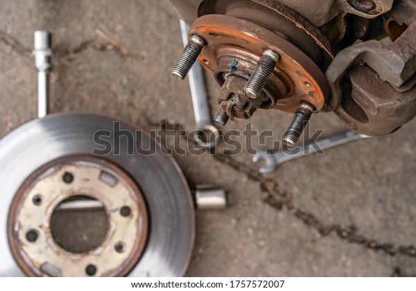 Replacing car rims, car\
repair
