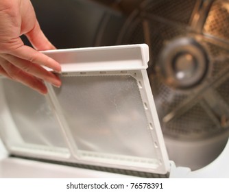 replacing the screen in the lint trap of a clothes dryer