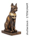 
replica of a statue of the Egyptian cat goddess Bastet on white studio isolated background