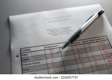 Report card from a school with poor and very poor grades - Powered by Shutterstock