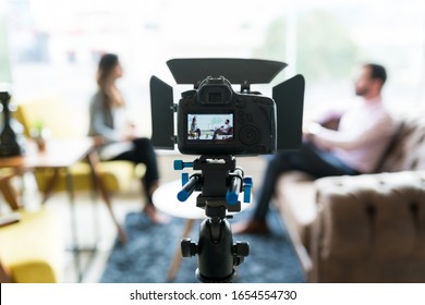 Reporter Interviewing Businessman Seen On Video Camera Display At Office