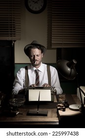 Reporter Working Late At Night And Smoking In His Office, 1950s Film Noir Style.