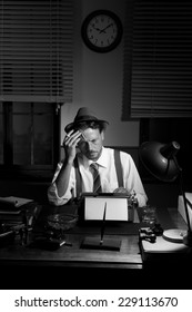 Reporter Working Late At Night And Smoking In His Office, 1950s Film Noir Style.