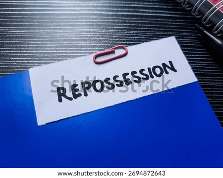Repossession writting on table background.