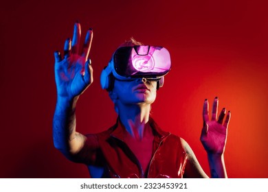 Representation of a bionic super human with advanced technology parts as vr visors and gadgets playing in a mixed reality training room. Futuristic cyberpunk evolution of human mankind and AI