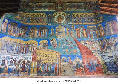 Representation of the Last Judgment on the west wall at Voronet monastery,Bucovina. Voronet is a monastery in Romania, located in the town of Gura Humorului, Moldavia. - Shutterstock ID 231924718