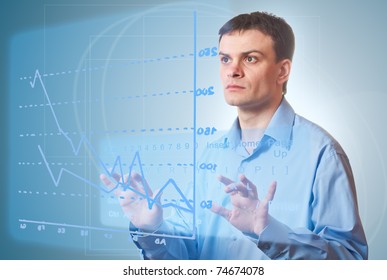Representative young Men pushing a button on a touch screen looking on virtual display