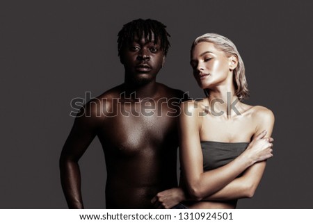 Representing diversity. Two professional international models representing diversity posing together