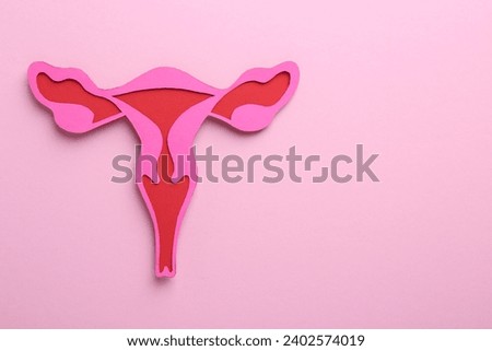 Reproductive medicine. Paper uterus on pink background, top view with space for text Stock photo © 