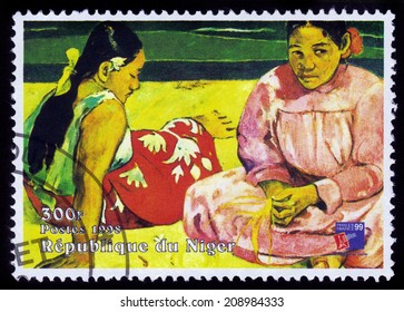REPUBLIC NIGER - CIRCA 1998: A stamp printed in Niger shows painting by Paul Gauguin, Tahitian Women on the Beach, series, circa 1998