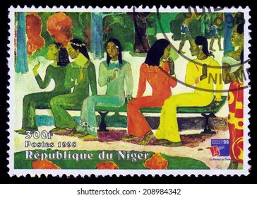 REPUBLIC NIGER - CIRCA 1998: A stamp printed in Niger shows painting by Paul Gauguin, Ta Matete Aka the Market, series, circa 1998