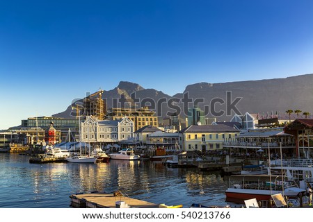 Republic of South Africa. Cape Town (Kaapstad). Waterfront - Victoria Basin with historical buildings. Devil's Peak and Table Mountain in the background