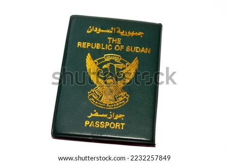 The Republic of Sudan passport with a gilded falcon in the center of the front cover, selective focus of Sudanese passport identity of North Sudan used for having visa stamps during traveling