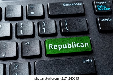 Republican Green Key On A Black Laptop Keyboard. United States Elections, Voting Online For Republican Party, Politics Concept. Republican Word Message On The Enter Key Of Desktop Computer. Top View.