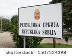Republika Srbija - Republic of Serbia, board written in Serbian cyrillic and latin script, border crossing sign on Danube river in Veliko Gradiste, Serbia, border with Romania and European Union