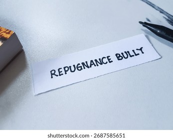 Repugnance bully writting on table background.