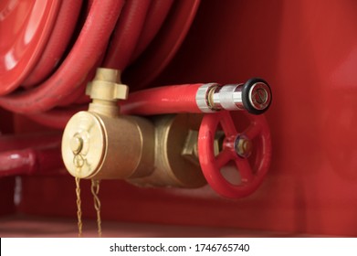 Rescue firefighter equipment, fire line in red box.Fire hose reel in the public building area.Fire fighting and safety concept.
