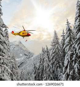 Rescue Helicopter With Rescuer At The Winch