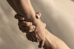 Rescue, Helping Gesture Or Hands. Two Hands, Helping Arm Of A Friend Teamwork. Helping Hand Outstretched, Arm, Salvation.