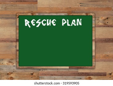 'rescue plan' write on green board on wood background
