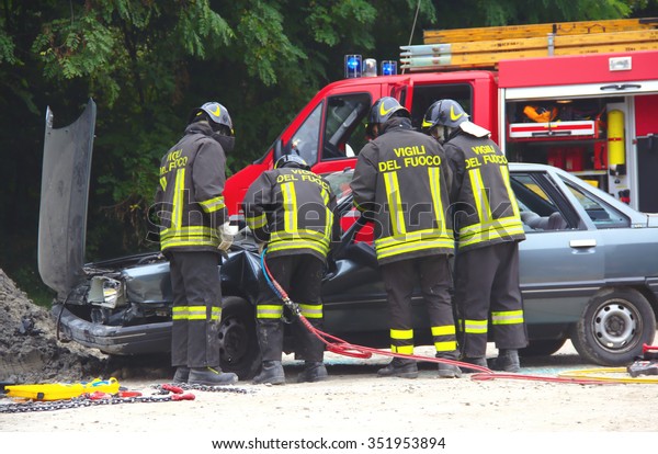 Rescue\
simulation of accident.\
Simulation of road accidents, joint\
intervention between firefighters and rescuers. Val Della Torre,\
Italy - September, 28 2014  (Red\
Cross).\
