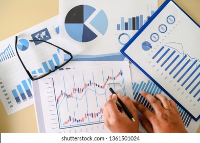 research documents with analytics data Brainstorm Meeting Businessman financial report