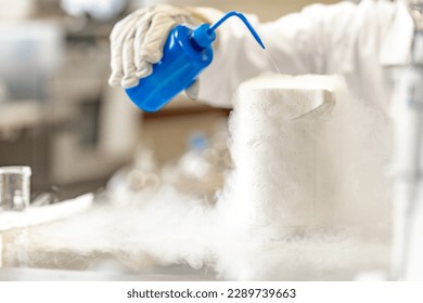 research with liquid nitrogen in a scientific laboratory. chemical reaction by mixing liquids - Powered by Shutterstock