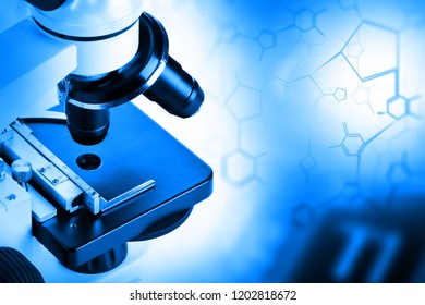 Research microscope with molecule structural formula blue tinted research or science concept - Powered by Shutterstock - Get 15% off with code: PIKWIZARD15