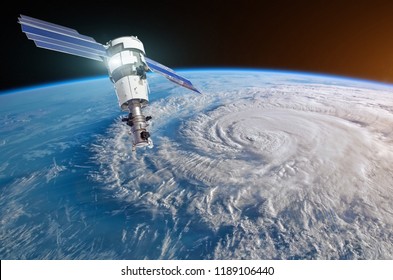 Research, Probing, Monitoring Hurricane Raging On The Coast. Satellite Above The Earth Makes Measurements Of The Weather Parameters. Elements Of This Image Furnished By NASA