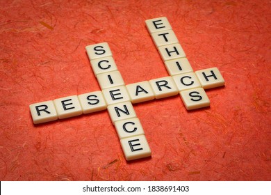 Research And Science Ethics - Crossword In Ivory Letters Against Textured Handmade Bark Paper