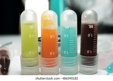 Research Vial Cancer Immunotherapy With Laboratory Glassware Background