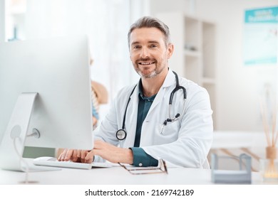 Research is what allows me decide how to best treat patients. Portrait of a mature doctor working on a computer in a medical office. - Powered by Shutterstock