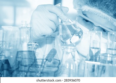 A Researcher Is Doing His Chemical Lab Research At Laboratory.